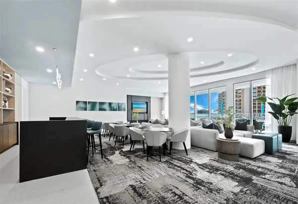 a living room with furniture and a table