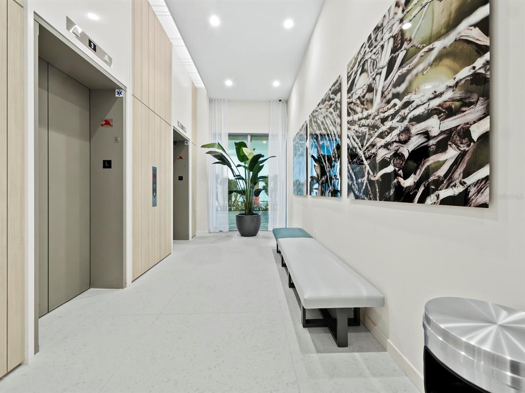 301 Quay Commons, Unit 1409 Sarasota, FL 34236 - Photo 31 of 45 a view of a hallway with seating area