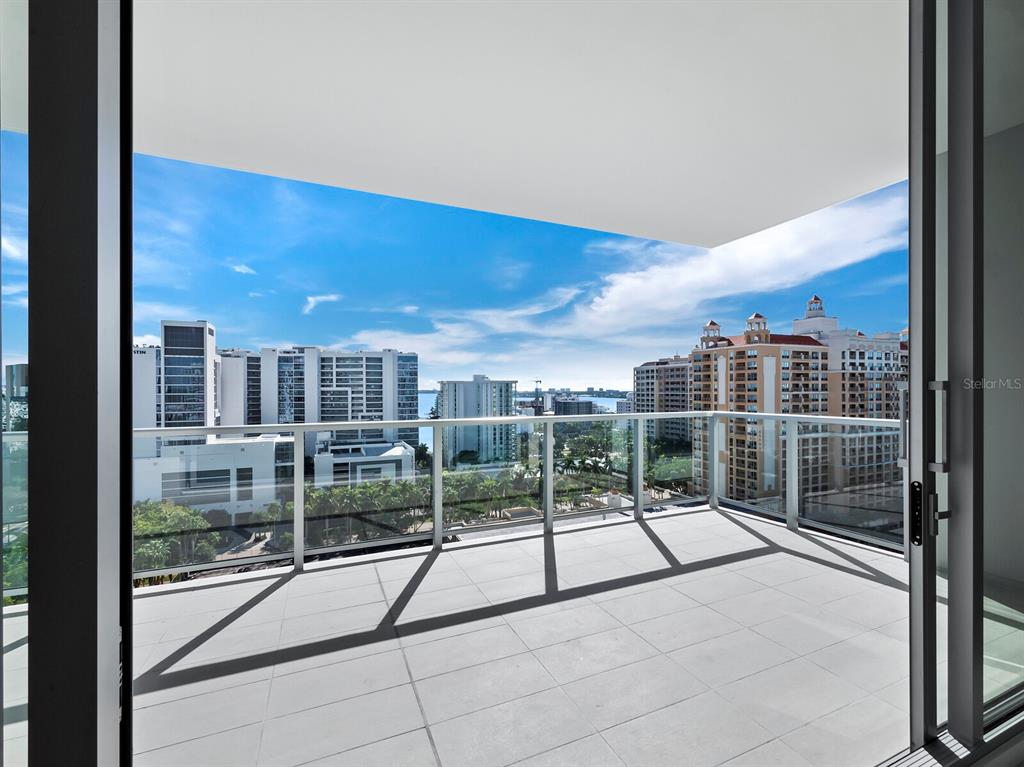 301 Quay Commons, Unit 1409 Sarasota, FL 34236 - Photo 6 of 45 a view of roof deck with tall buildings