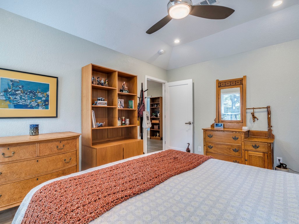 1008 Riviera Drive Cedar Park, TX 78613 - Photo 14 of 32 a bed room with a bed and a dresser
