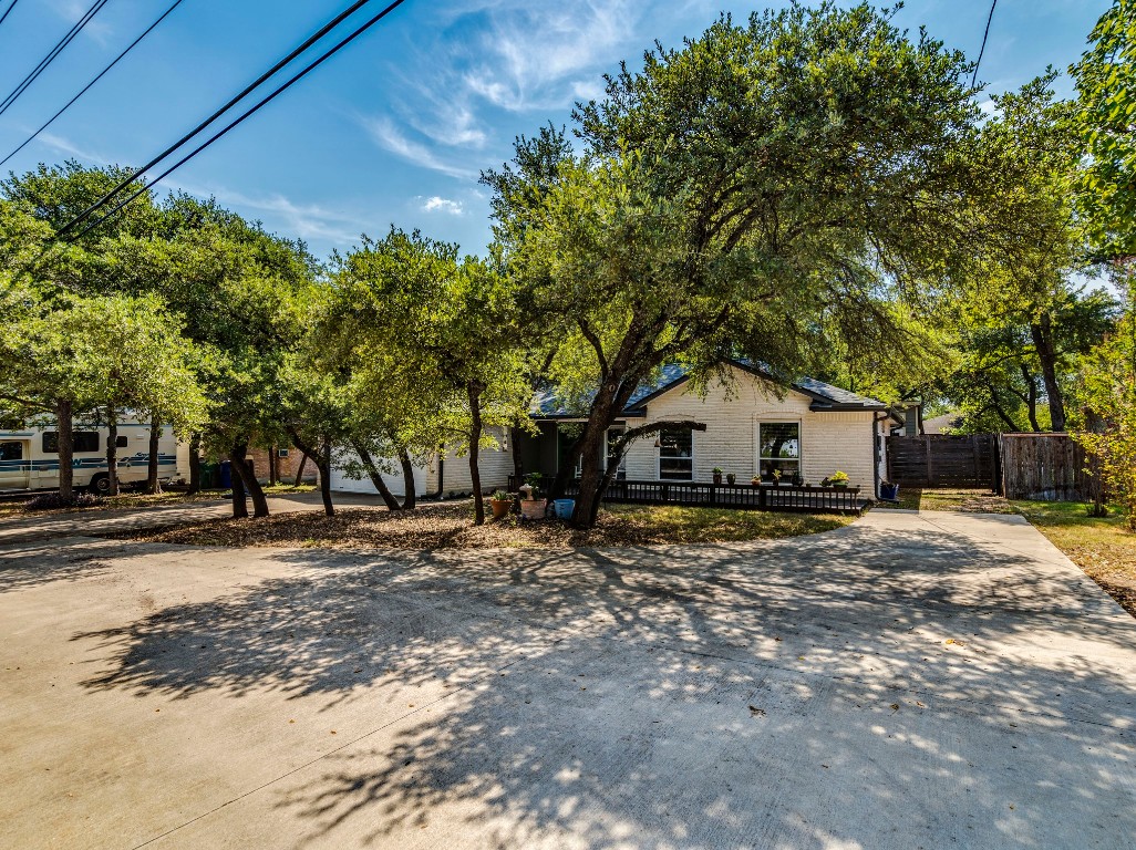 1008 Riviera Drive Cedar Park, TX 78613 - Photo 31 of 32 a tree in front of a white house