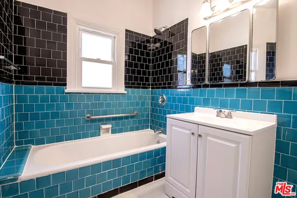 a bathroom with a sink and a bathtub