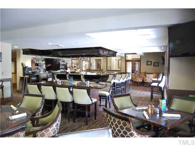 800 West Savannah Ridge Road, Unit 110 Holly Springs, NC 27540 - Photo 11 of 15 Golf Club Lounge: Socializing is easy with this convenient lounge in walking distance from your doorstep.