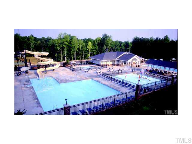 800 West Savannah Ridge Road, Unit 110 Holly Springs, NC 27540 - Photo 15 of 15 3 aquatic parks to choose from! This one boasts a water slide, sprayground, lap pool, kiddy pool & clubhouse. Fitness classes taught in the club house. On-site park offers a playground, basket ball court and ball field.
