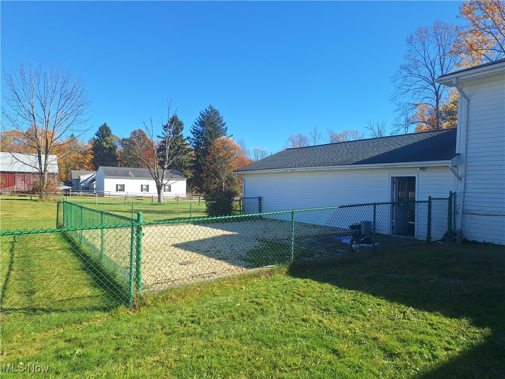 9250 Sherman Road Chesterland, OH 44026 - Photo 20 of 23 Fenced dog run off attached garage