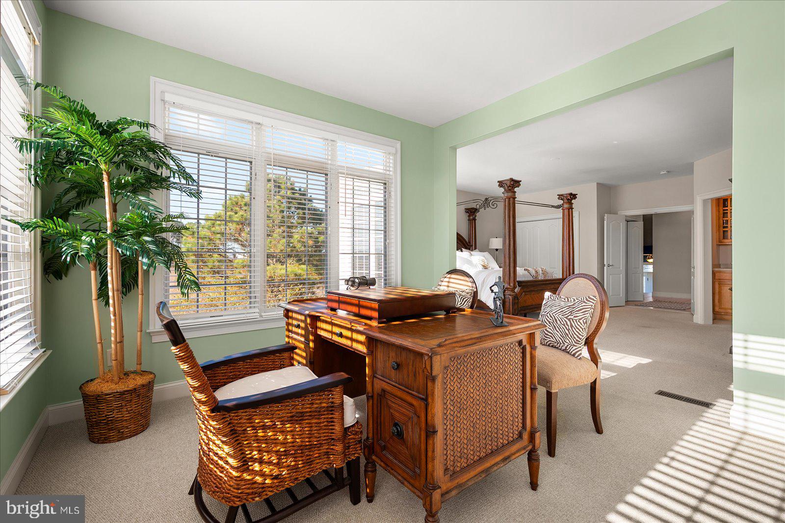 12901 Old Bridge Road, Unit PH8 2 Ocean City, MD 21842 - Photo 29 of 79 a living room with furniture and a potted plant