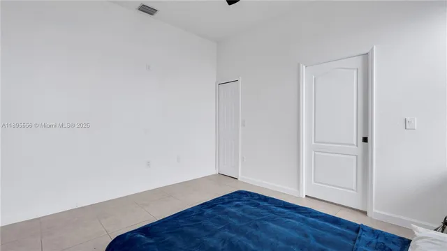 a view of room window and wooden floor
