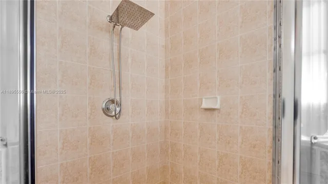 a bathroom with a sink vanity and a mirror