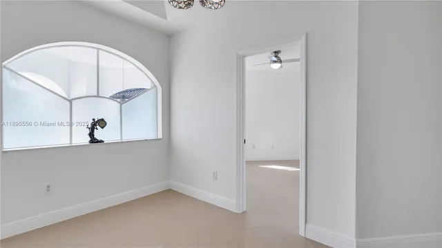 a view of entryway and hall with a window