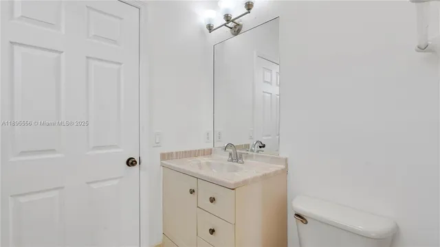 a aerial view of a house with a yard