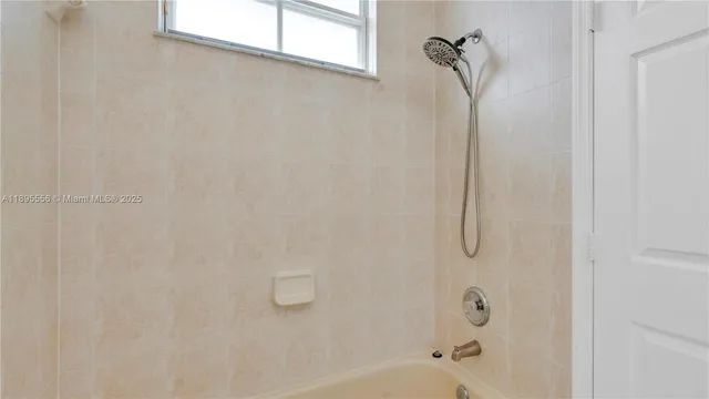 an aerial view of multiple houses with yard