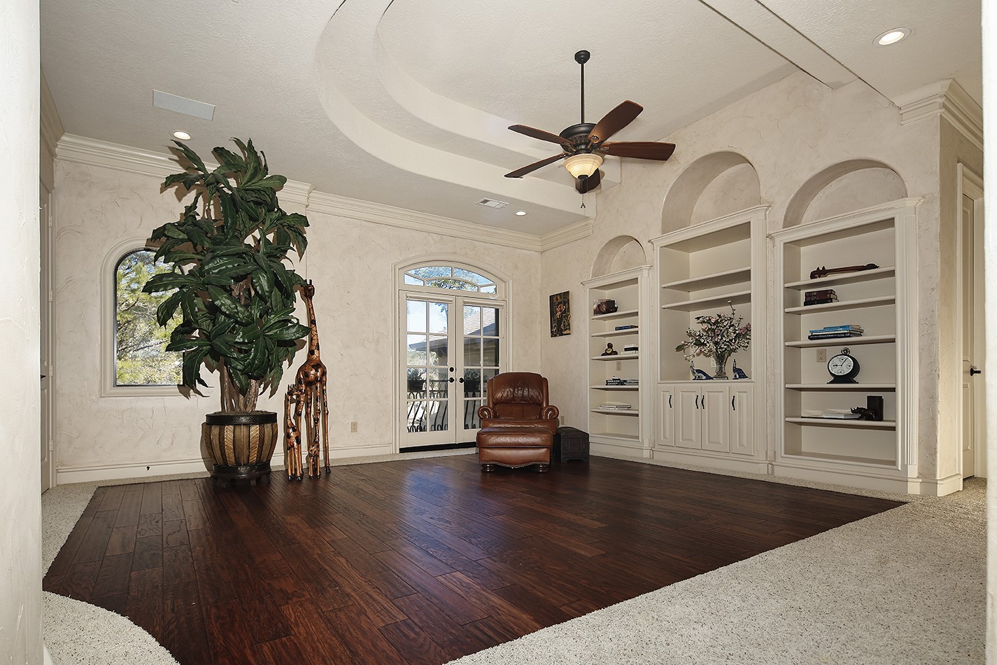 134 South Tranquil Path The Woodlands, TX 77380 - Photo 39 of 49 Second floor game room with wood flooring.