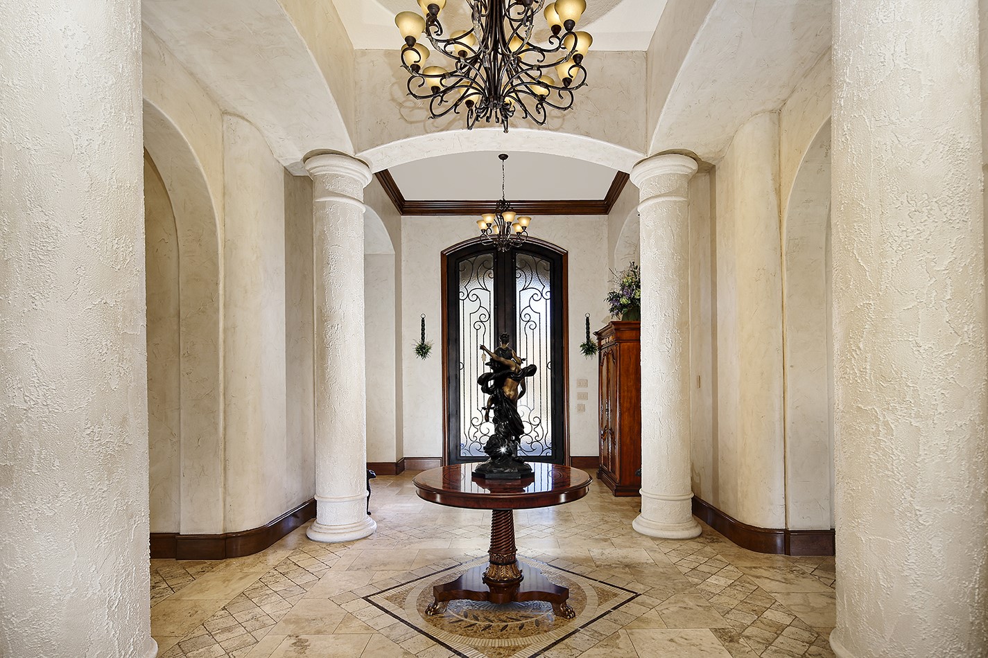 134 South Tranquil Path The Woodlands, TX 77380 - Photo 6 of 49 Intricate stonework in the pillared 2 story foyer.