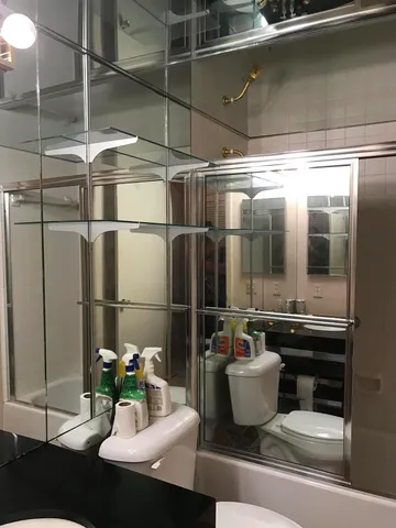 a kitchen with a refrigerator and a sink