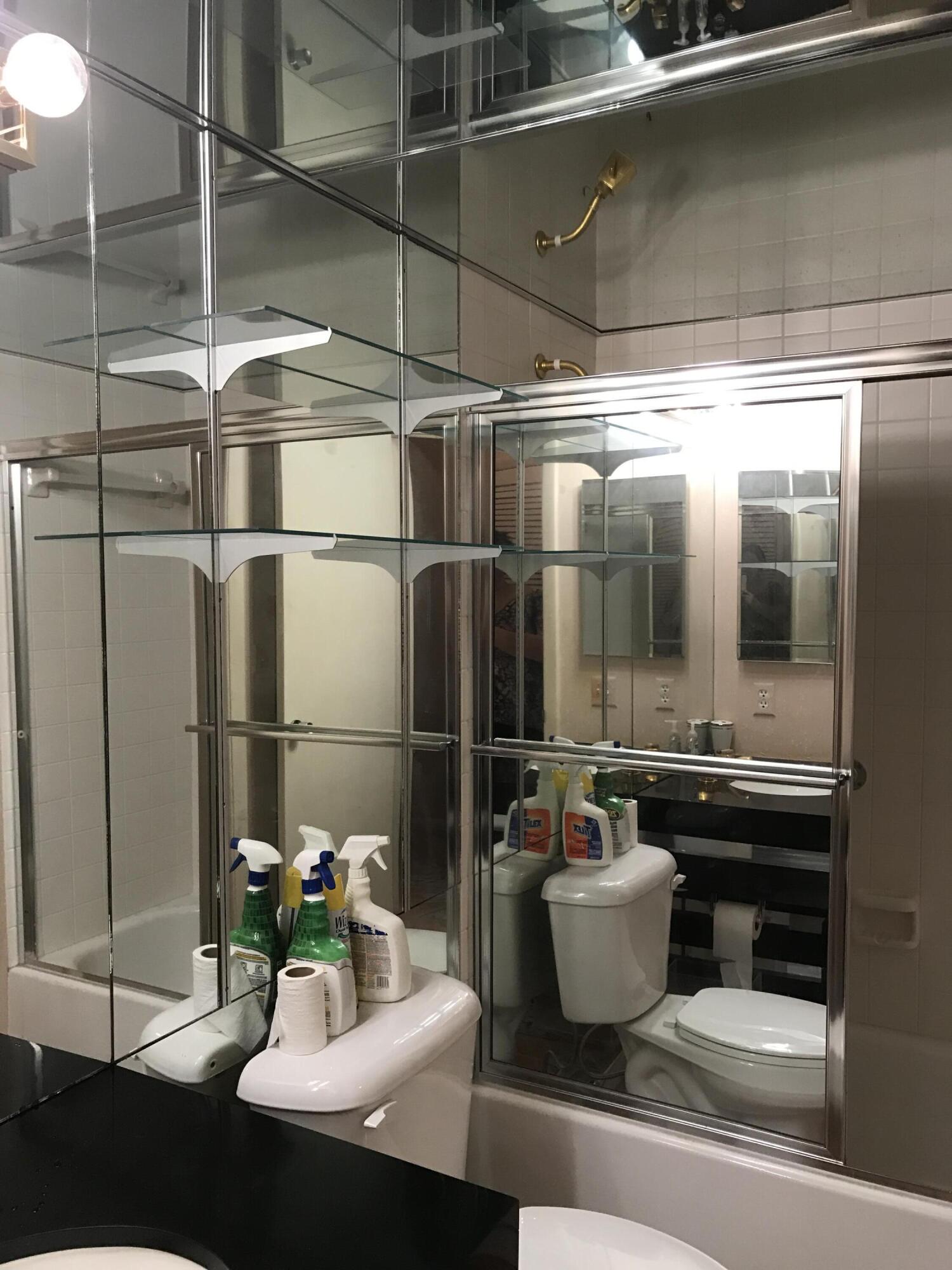 2520 Presidential Way, Unit 205 West Palm Beach, FL 33401 - Photo 16 of 22 a room with gym equipment