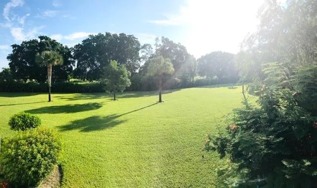 a view of a bathroom with a glass door shower