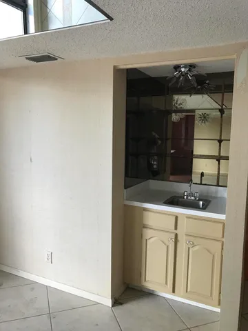 a bed room with a bed and a window