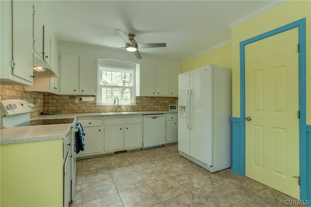 2863 Iverson Road Midlothian, VA 23112 - Photo 14 of 38 a kitchen with a refrigerator sink and cabinets