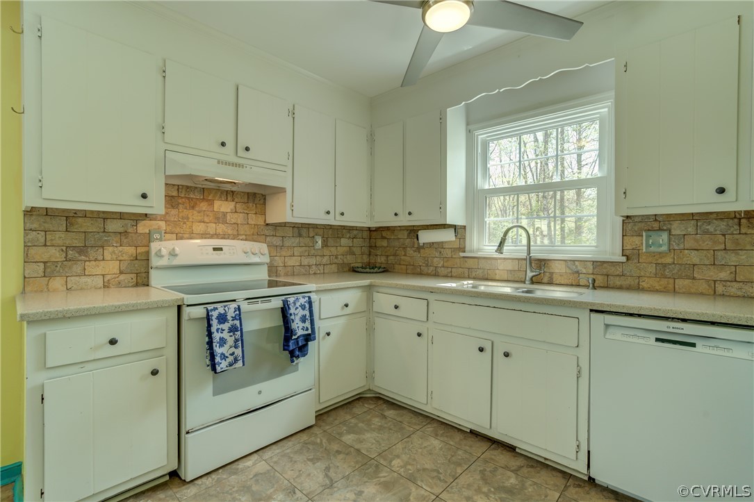2863 Iverson Road Midlothian, VA 23112 - Photo 15 of 38 a kitchen with granite countertop white cabinets and white appliances