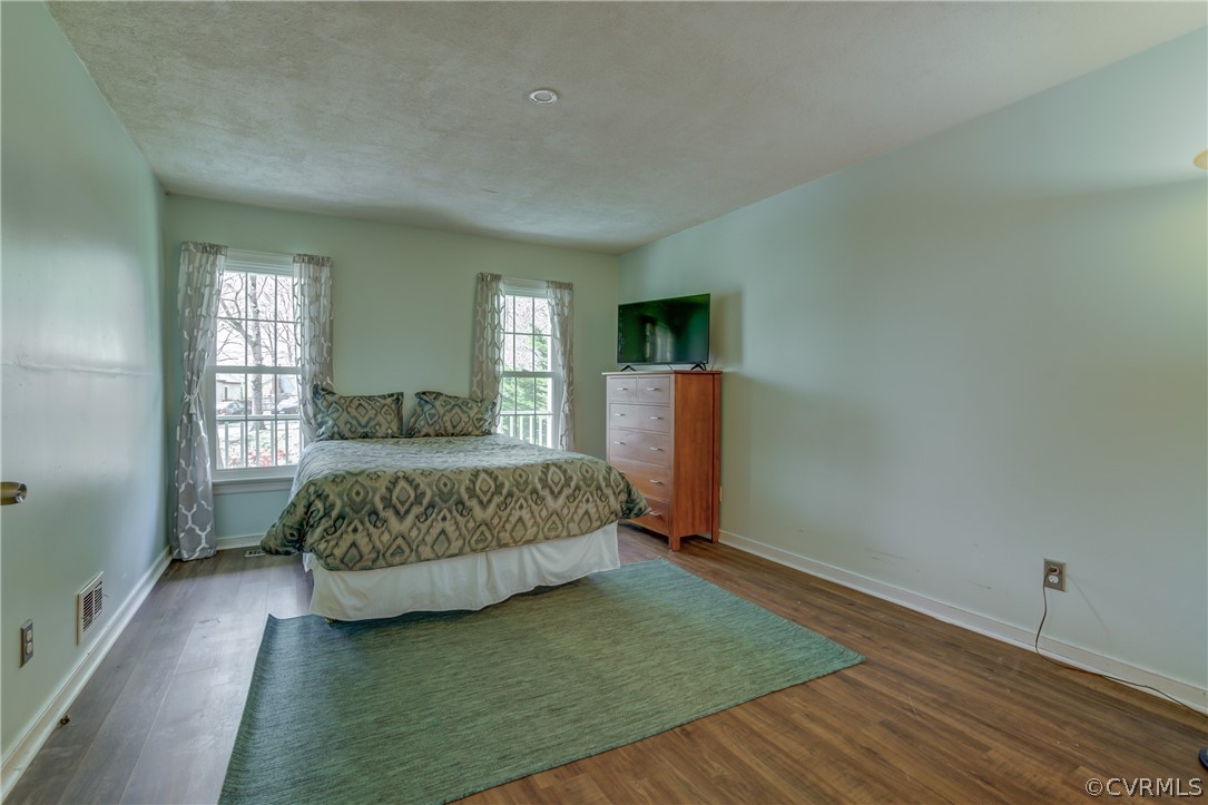2863 Iverson Road Midlothian, VA 23112 - Photo 18 of 38 a bedroom with a bed and a window