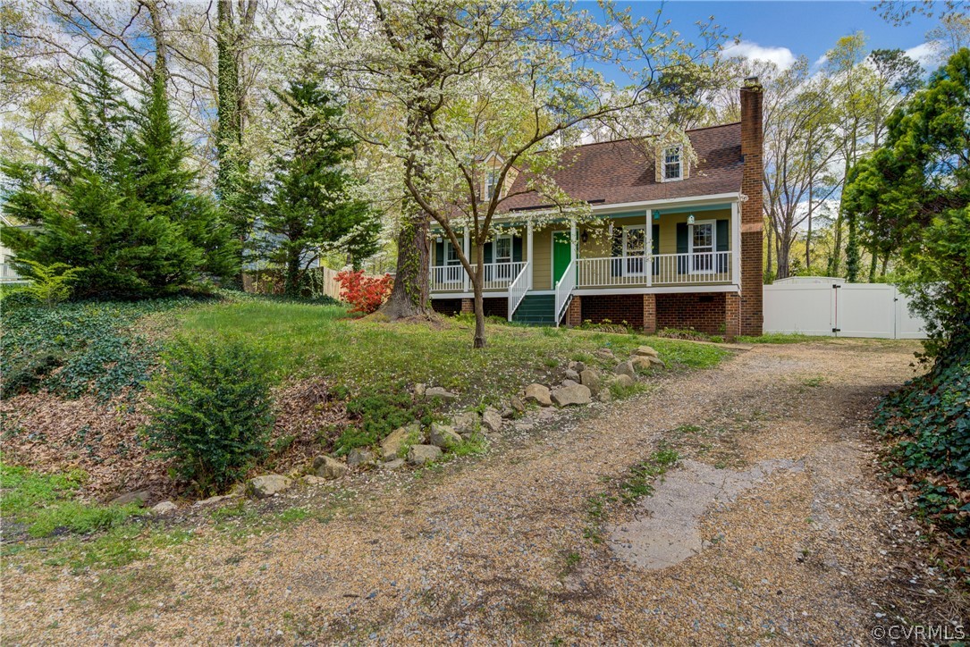 2863 Iverson Road Midlothian, VA 23112 - Photo 2 of 38 a view of a house with a yard