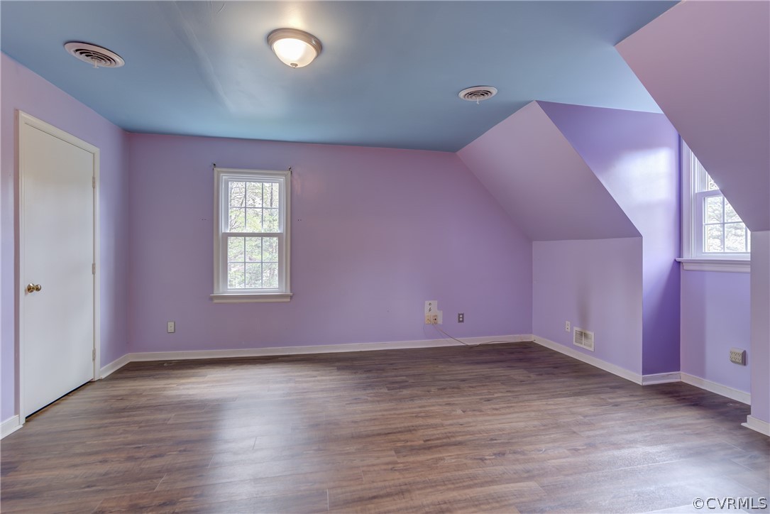 2863 Iverson Road Midlothian, VA 23112 - Photo 30 of 38 an empty room with wooden floor and windows