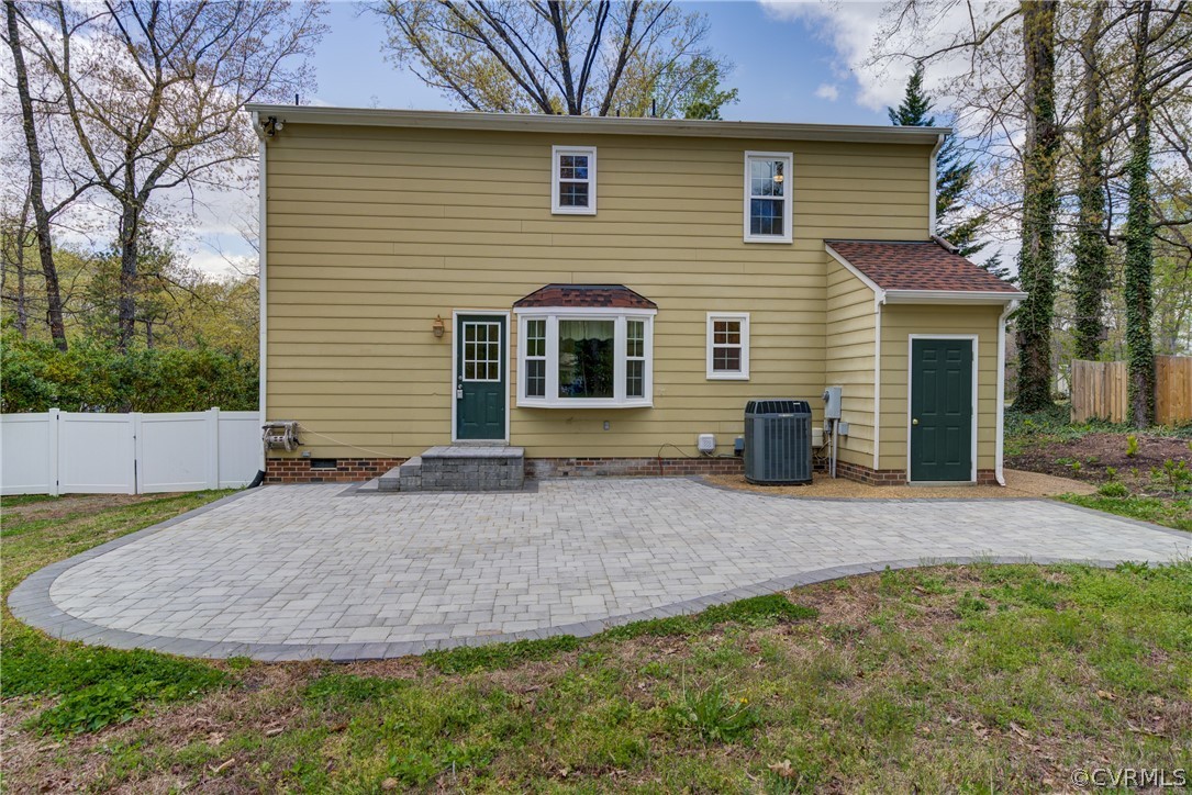 2863 Iverson Road Midlothian, VA 23112 - Photo 37 of 38 a view of a house with a small yard and tree