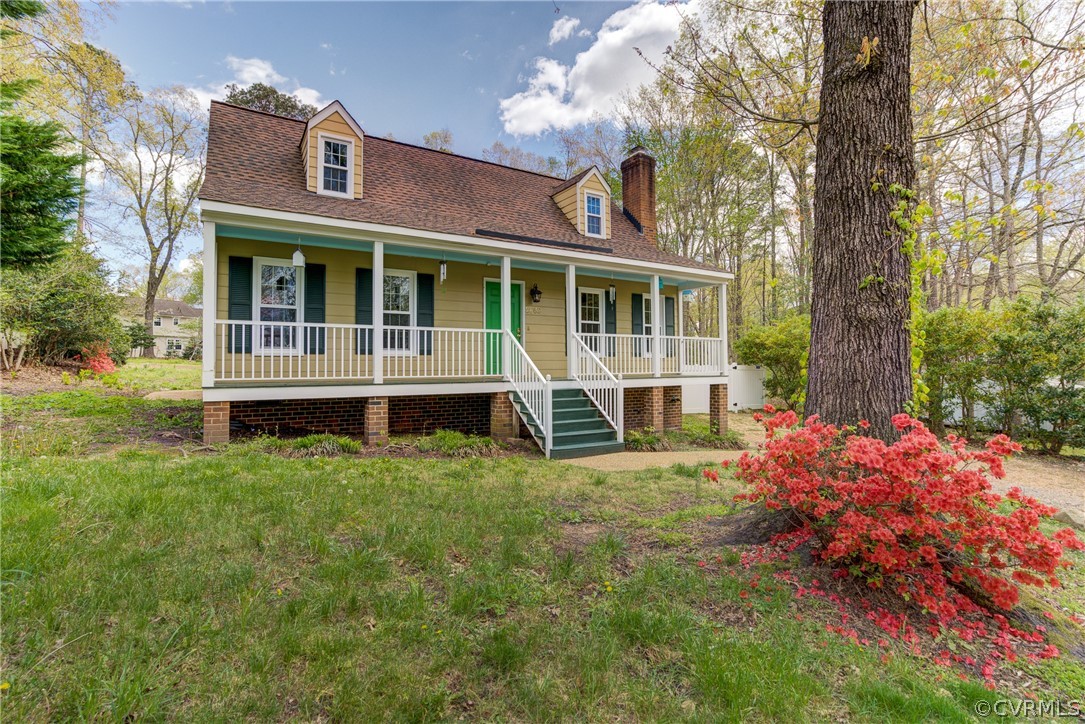 2863 Iverson Road Midlothian, VA 23112 - Photo 5 of 38 a front view of a house with yard and green space