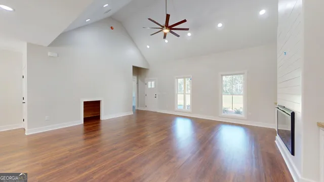 a view of empty room with windows