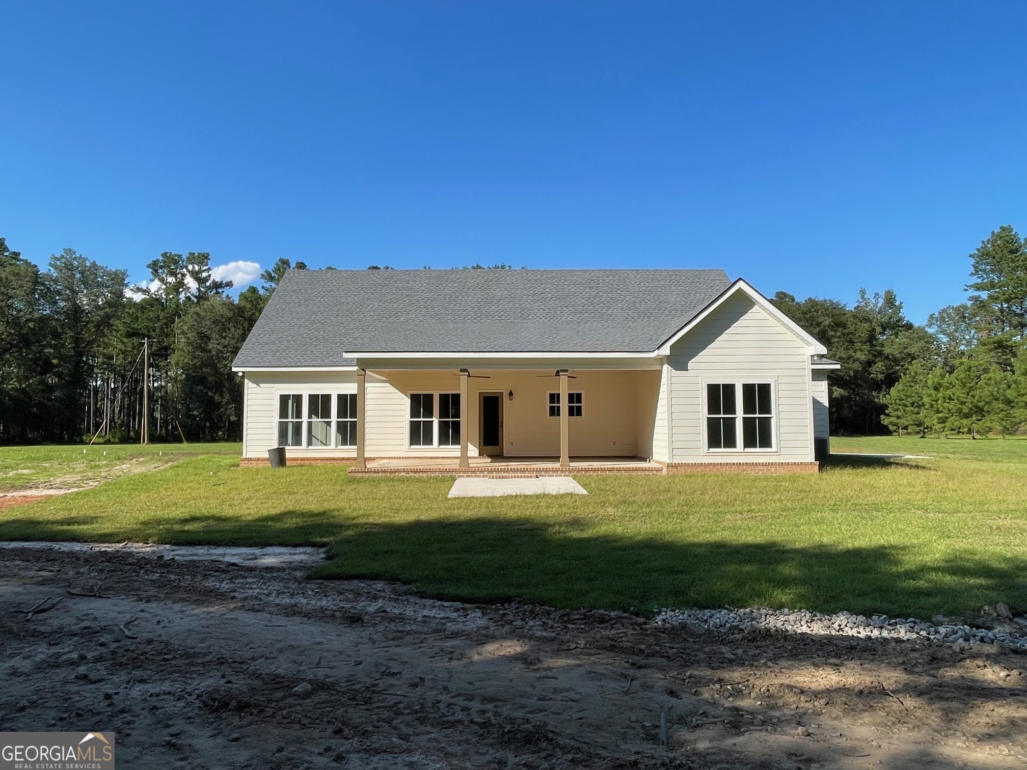 53 Jericho Lane Brooklet, GA 30415 - Photo 5 of 54 a front view of a house with a yard