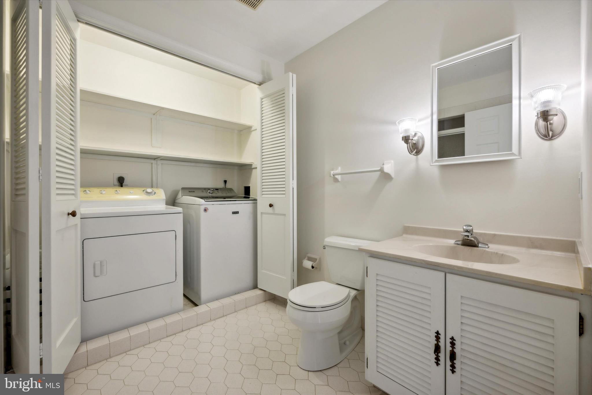 844 Hunt Road Newtown Square, PA 19073 - Photo 28 of 35 a bathroom with a sink toilet and mirror