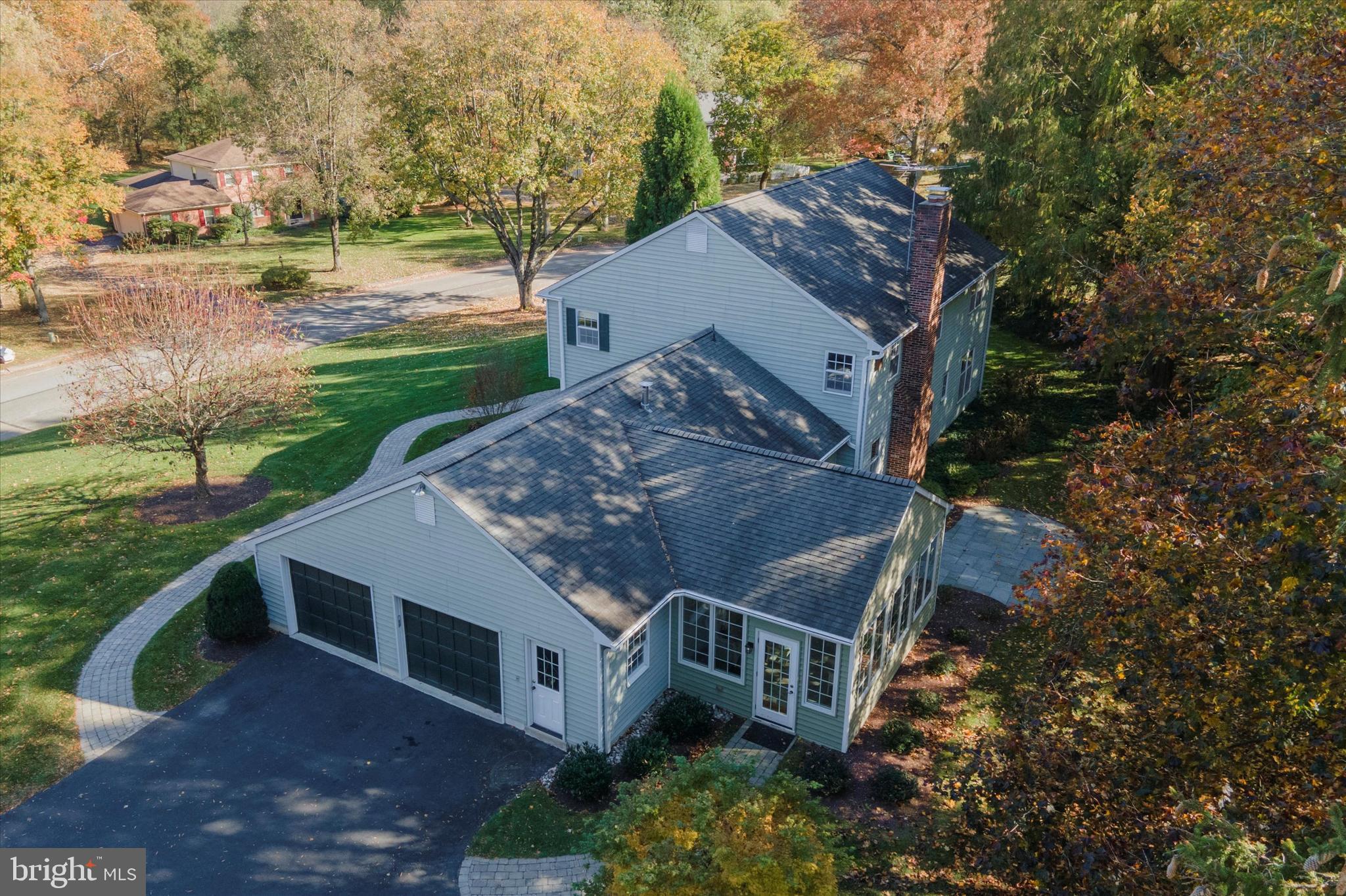 844 Hunt Road Newtown Square, PA 19073 - Photo 6 of 35 an aerial view of a house with a yard
