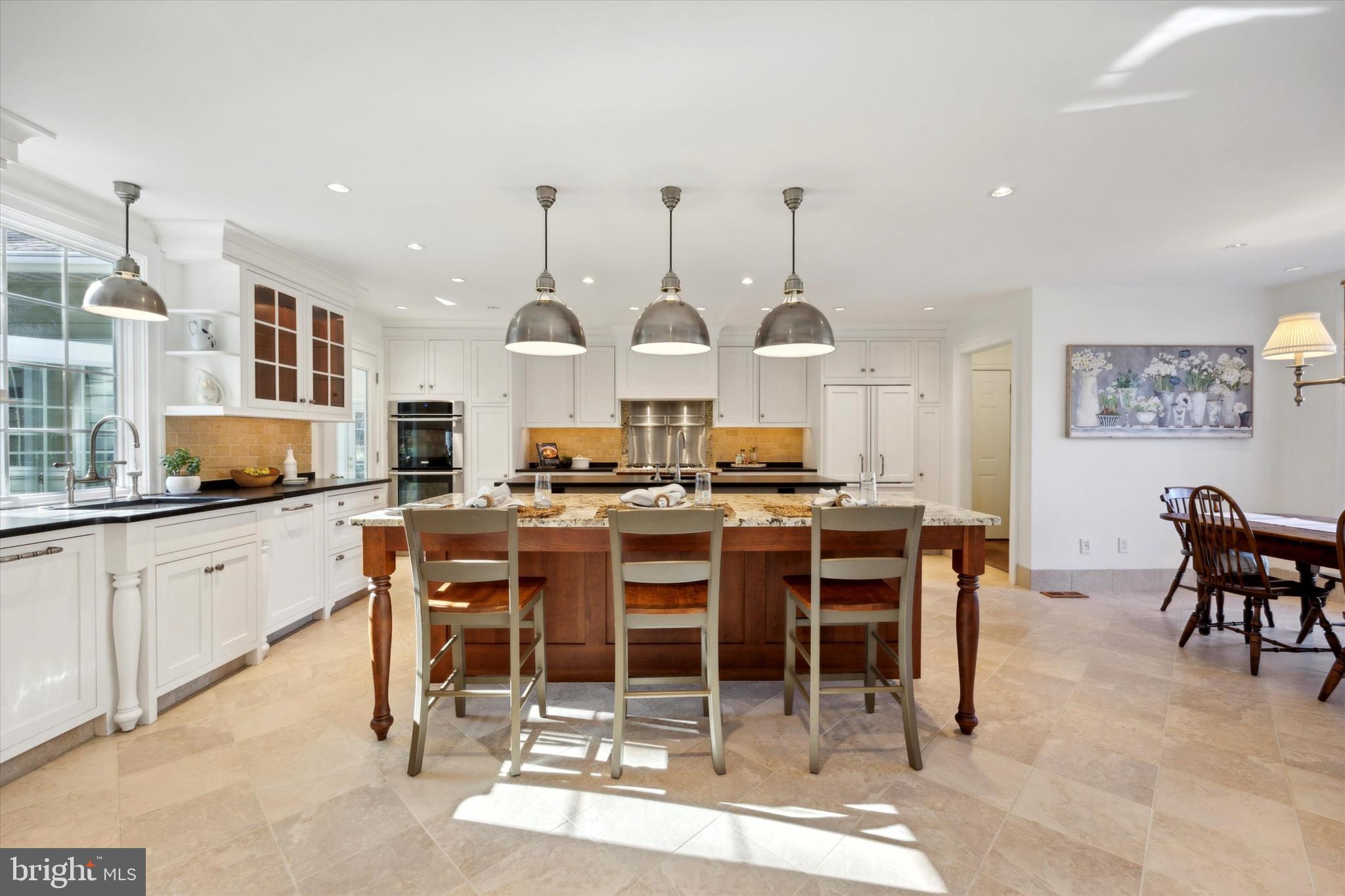 844 Hunt Road Newtown Square, PA 19073 - Photo 8 of 35 a kitchen with lots of counter space furniture and appliances