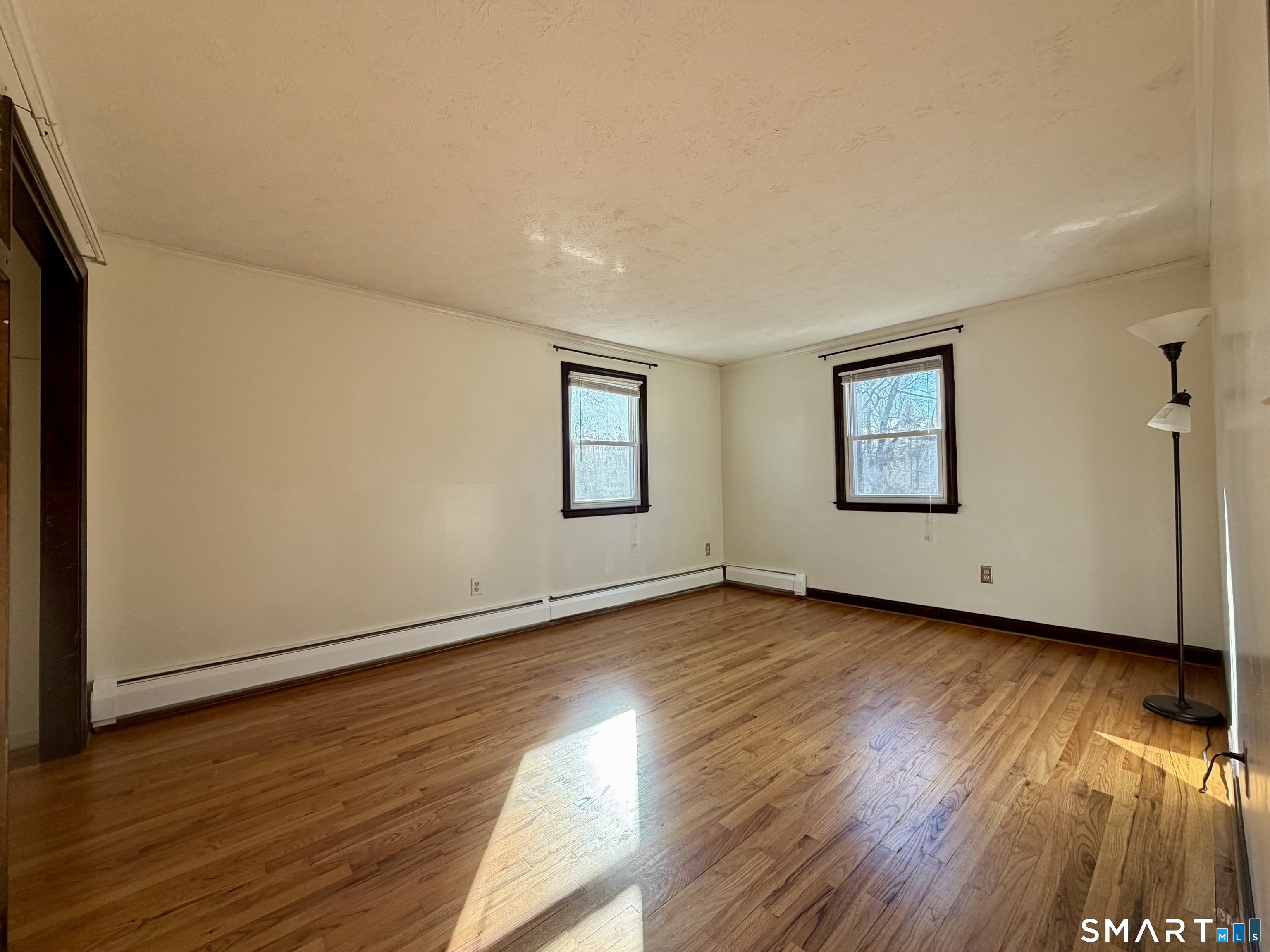 44 Crabapple Road Windsor, CT 06095 - Photo 25 of 38 a view of a room with wooden floor and window