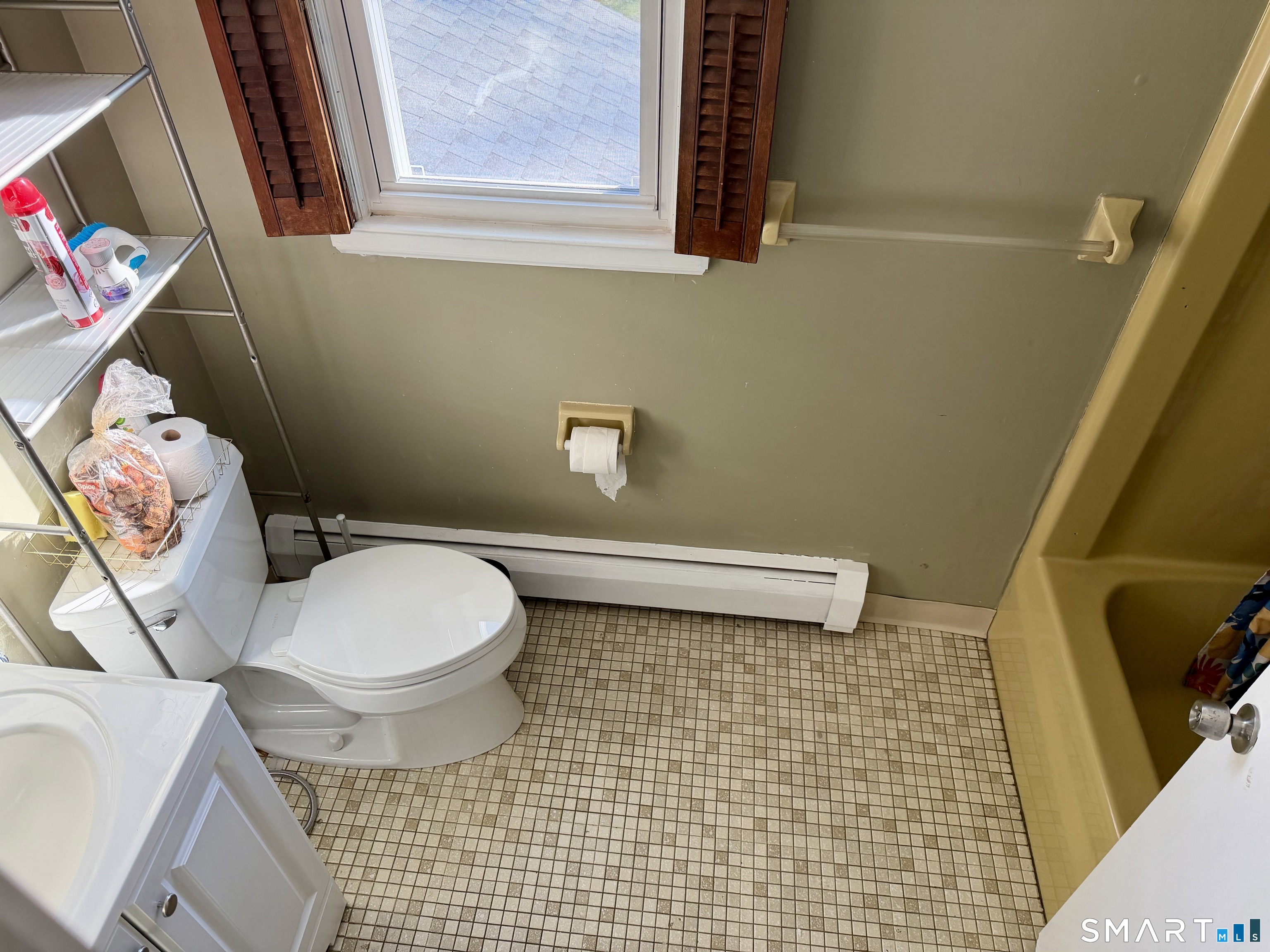 44 Crabapple Road Windsor, CT 06095 - Photo 29 of 38 a bathroom with a toilet and a shower curtain