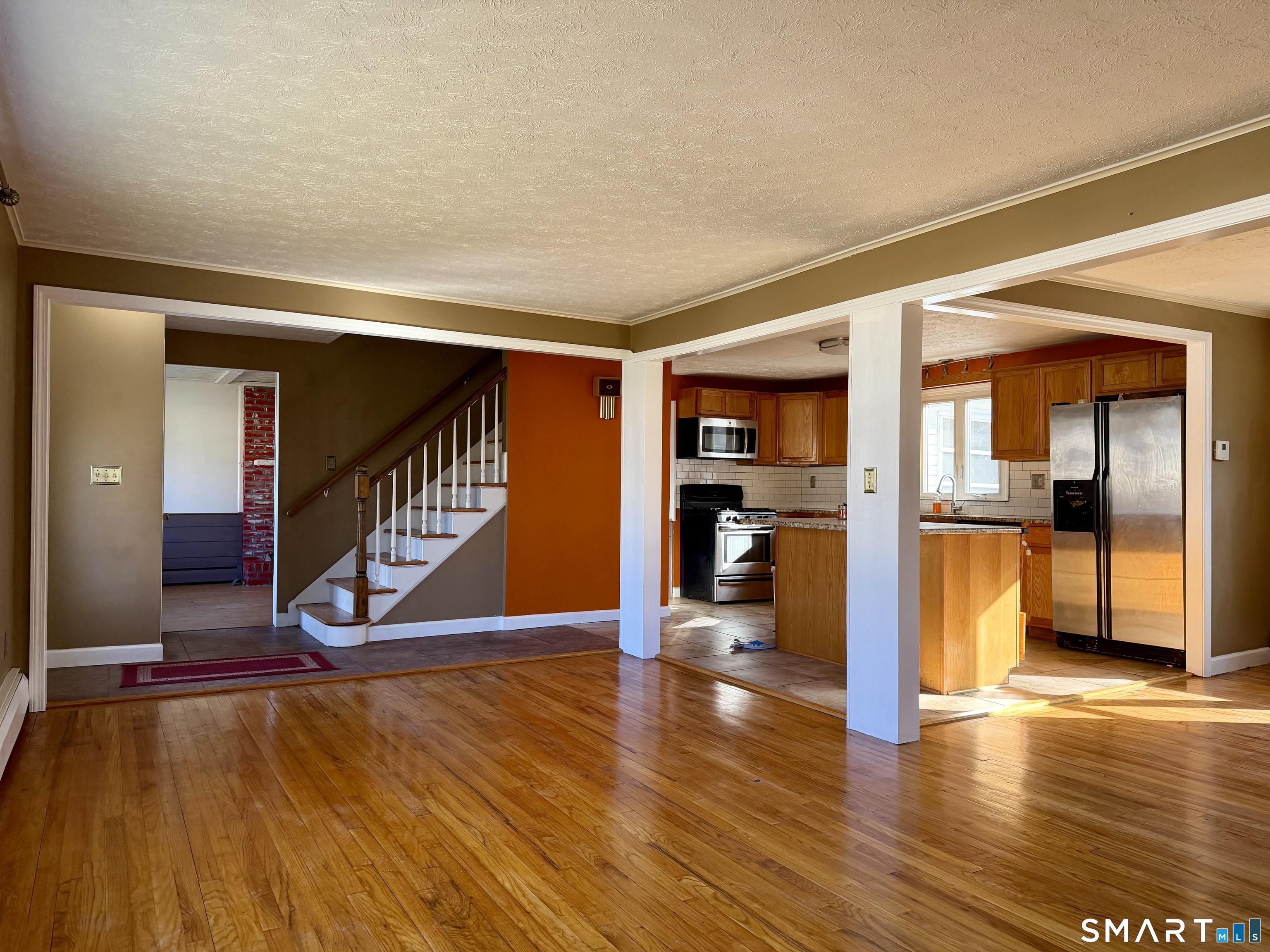 44 Crabapple Road Windsor, CT 06095 - Photo 4 of 38 a view of an entryway with wooden floor