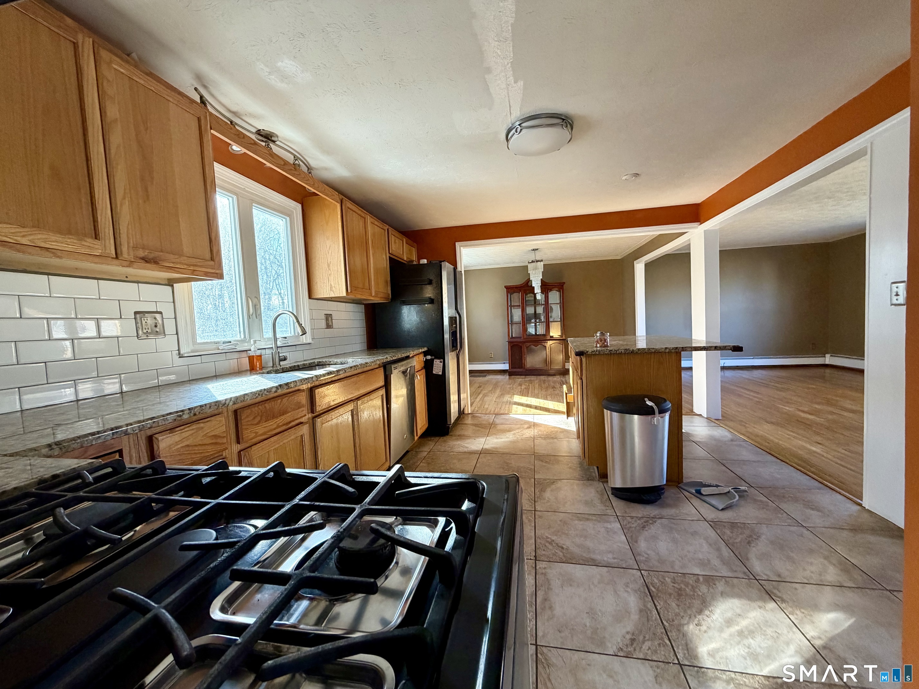 44 Crabapple Road Windsor, CT 06095 - Photo 10 of 38 a kitchen with table and chairs