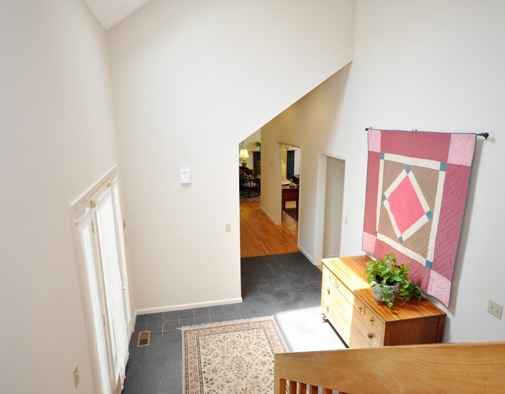 163 Sunset Road Carlisle, MA 01741 - Photo 4 of 19 a living room with furniture and painting on the wall