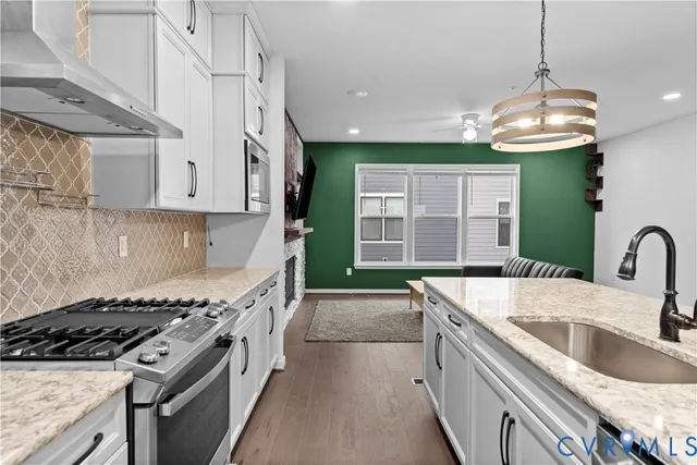 a view of a street with chairs