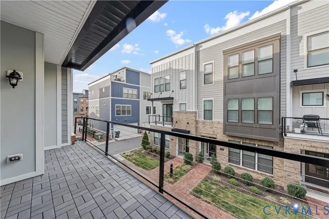 a view of a swimming pool with an outdoor seating