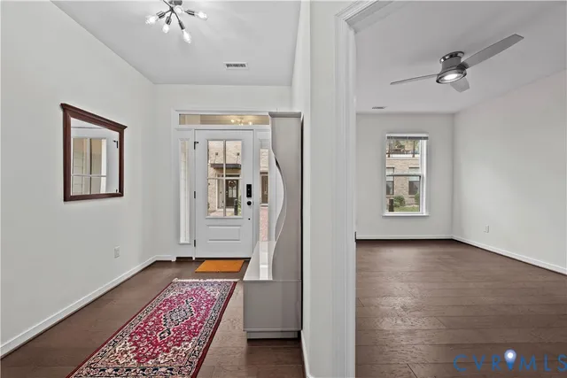 a spacious bathroom with a shower sink and mirror