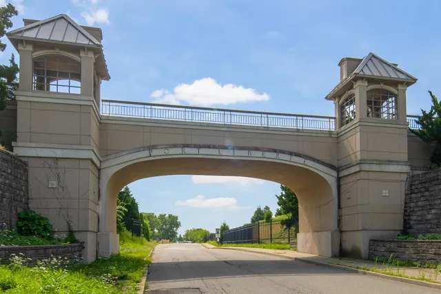 a view of a lake with building and outdoor space
