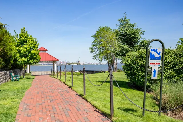 a view of a balcony with lake view