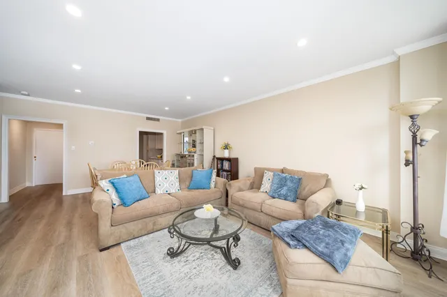 a living room with furniture and a couch