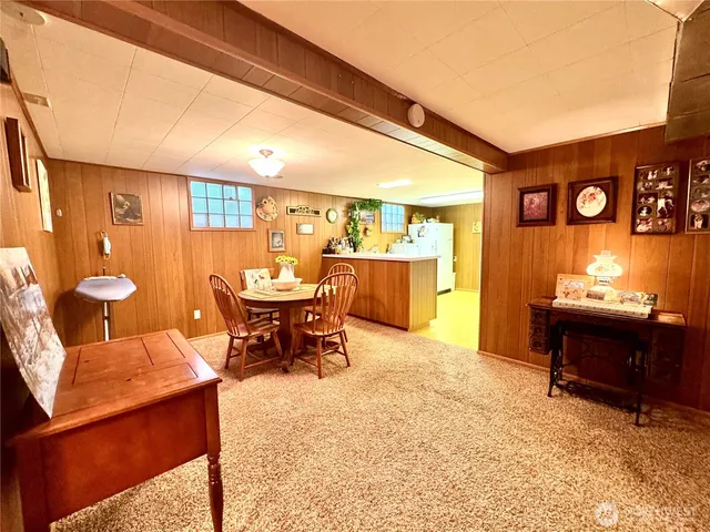 a view of a dining room with furniture