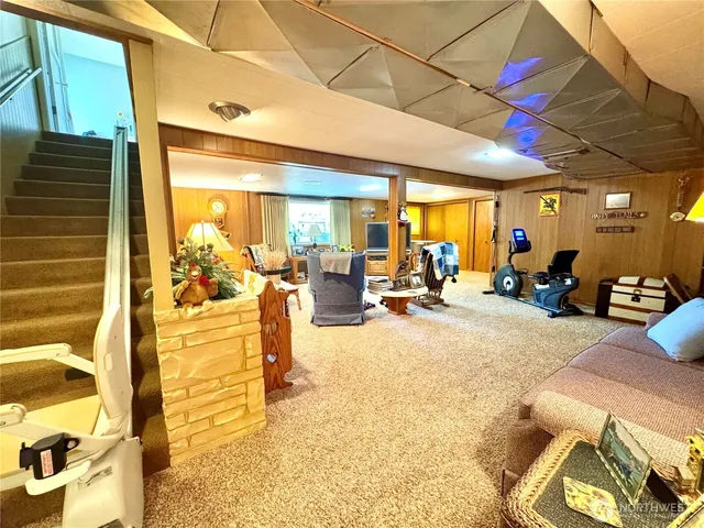 a view of a lobby with furniture and floor to ceiling window