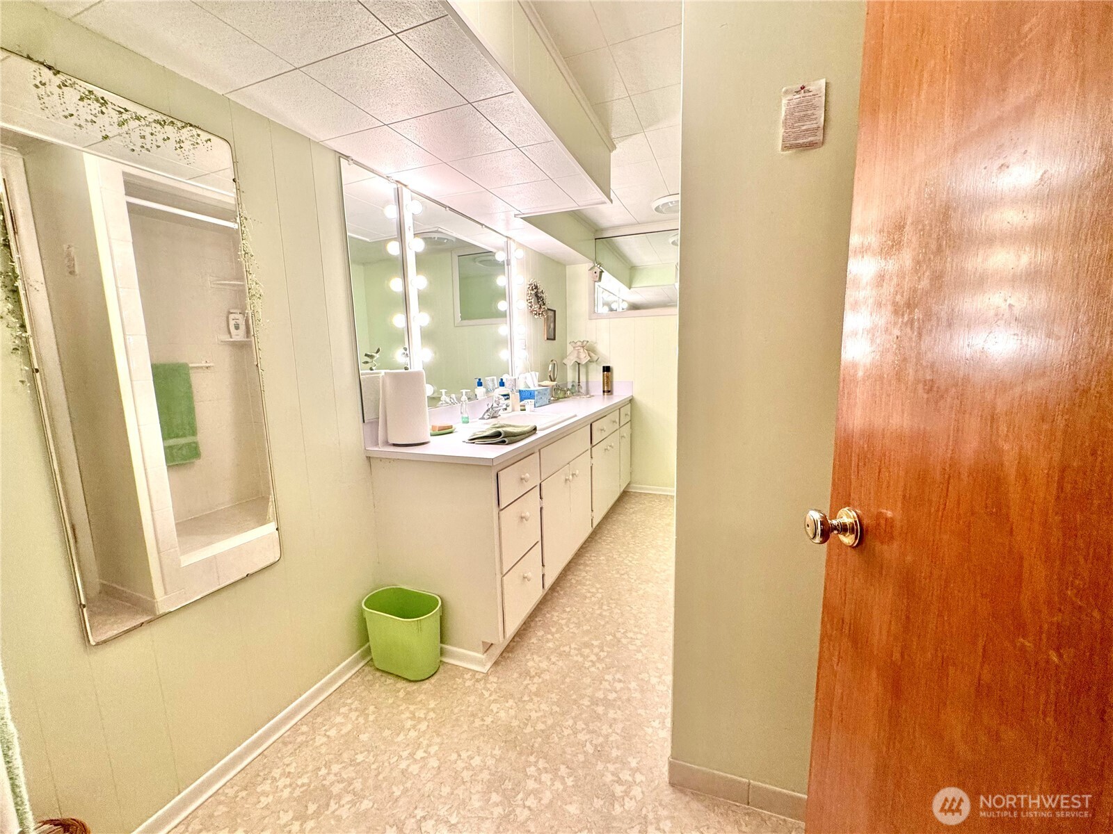 309 West 9th Avenue Ritzville, WA 99169 - Photo 23 of 31 a bathroom with a sink mirror and vanity