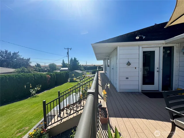 a view of a balcony with an outdoor space