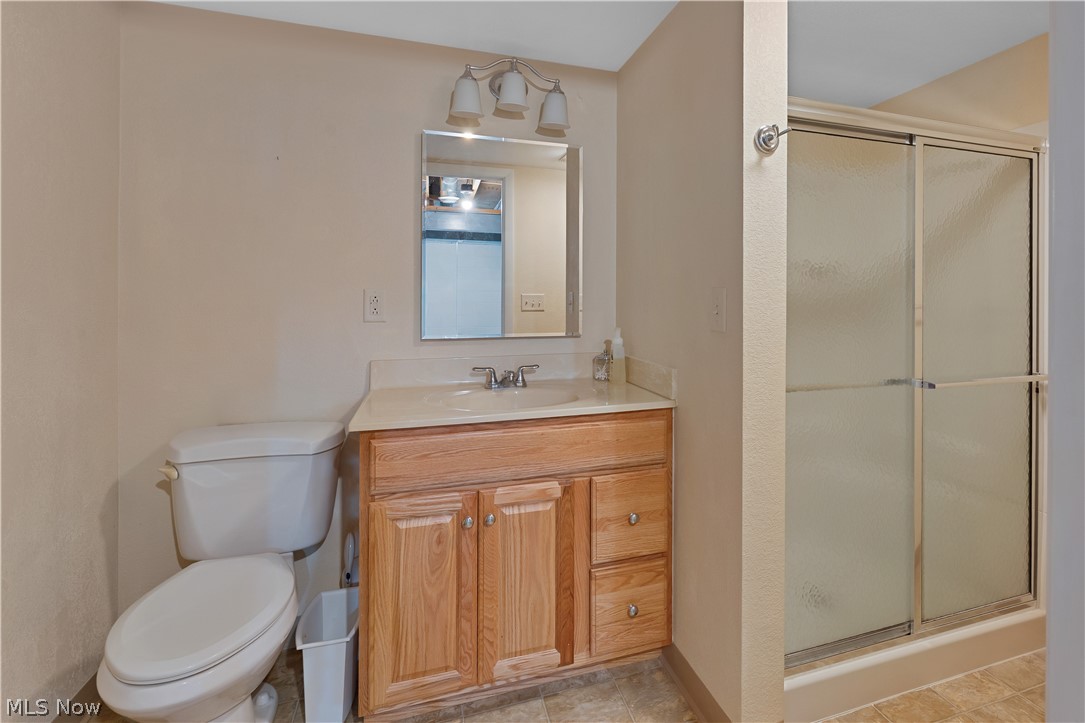 6599 Struthers Road Youngstown, OH 44514 - Photo 26 of 29 Full bath with a stall shower and vanity