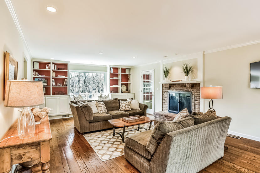 227 Marvin Ridge Road New Canaan, CT 06840 - Photo 15 of 34 a living room with furniture and a fireplace